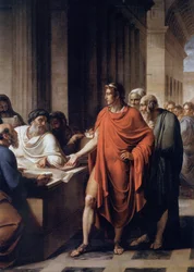 Ptolemy II Philadelphus examining a roll of papyrus